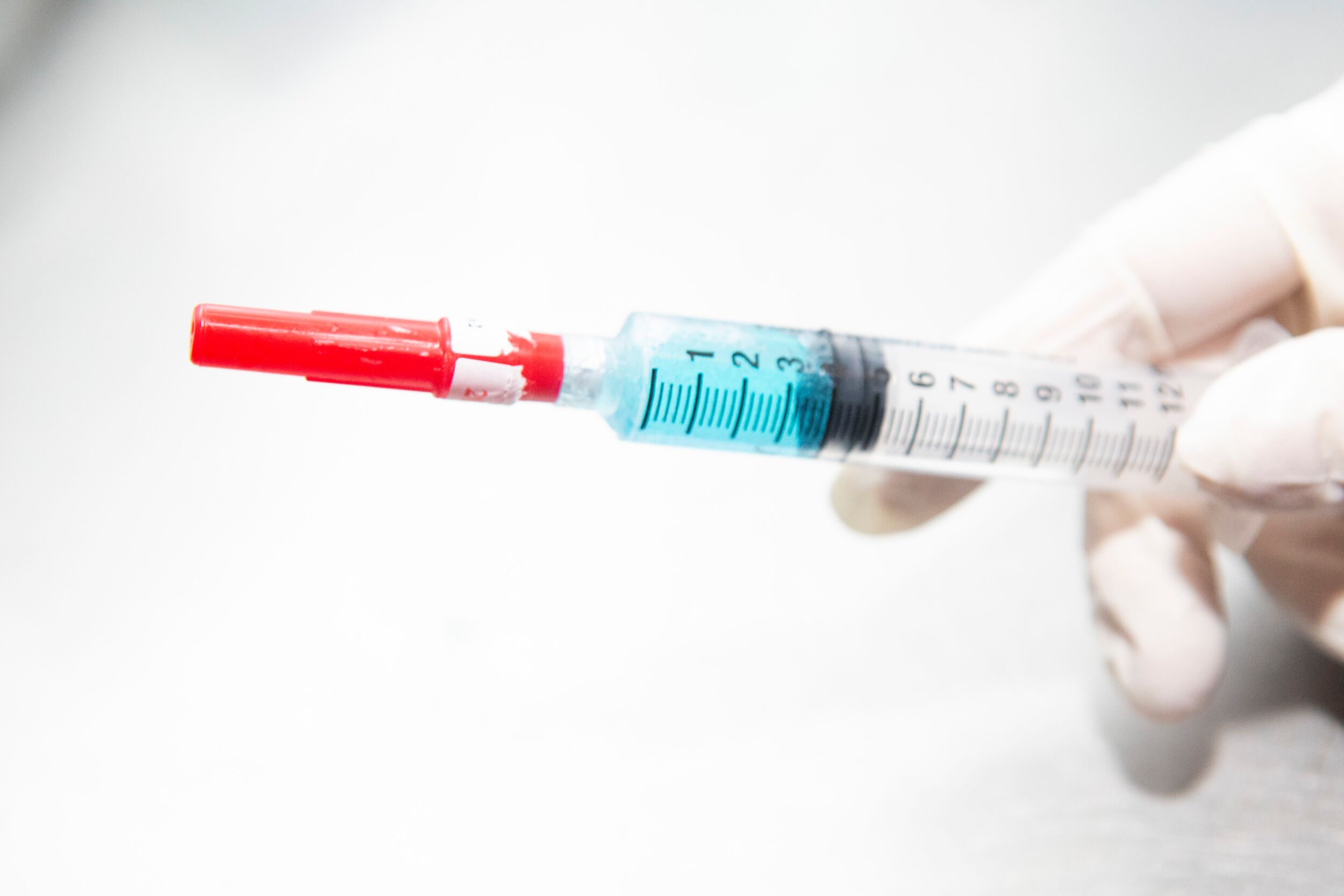 A photo of a vaccine syringe