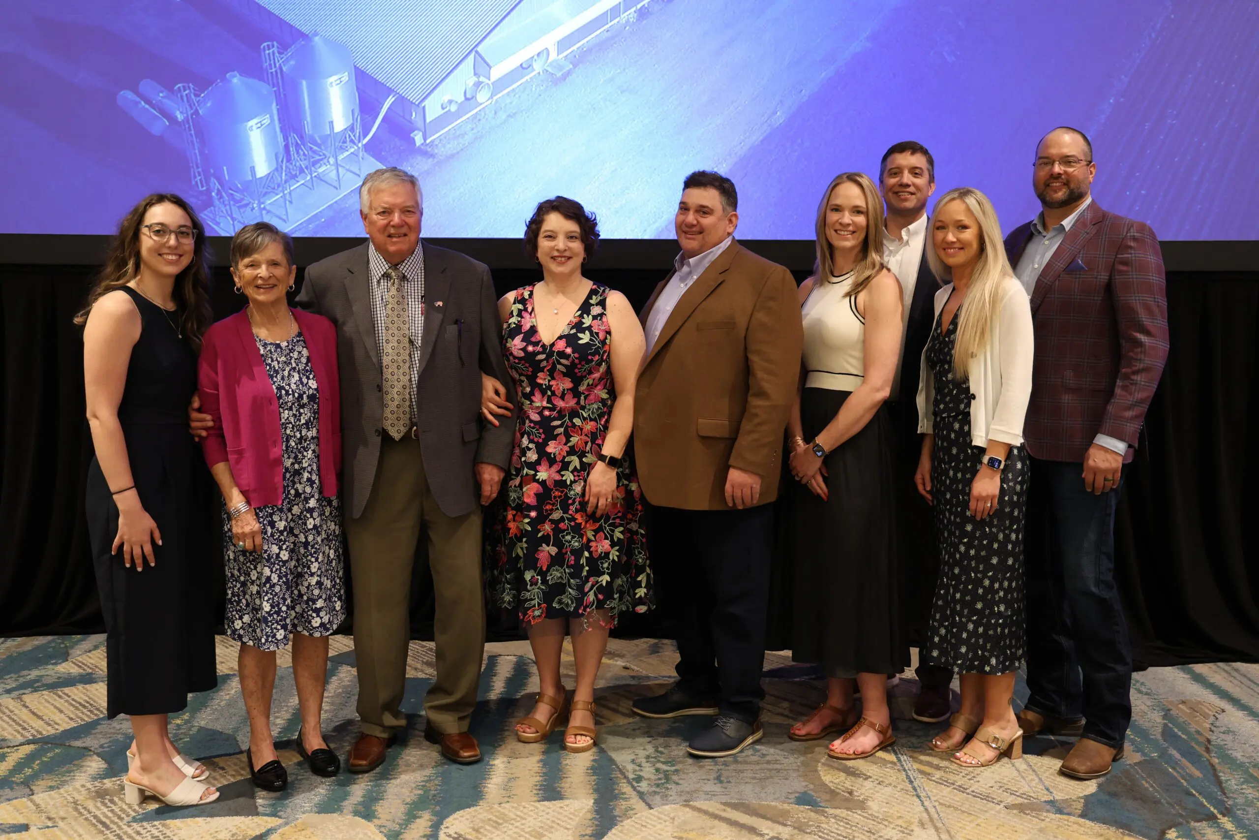 Dr. Howard Hill (third from left), pictured with his family, is inducted into the NPPC Hall of Fame.