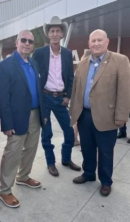 Left to right: NPPC President Duane Stateler and NPPC Past President and Ohio Pork Council President Bryan Black greet U.S. House Agriculture Committee Chairman Glenn “GT” Thompson (R-PA) at the Ohio State Fair.