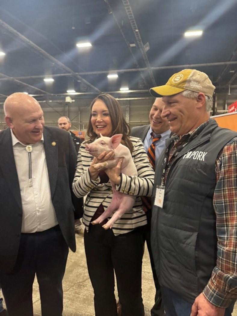 Left to right: Chairman Thompson, Secretary Rollins, and Pennsylvania pork producer Matt Brandt.