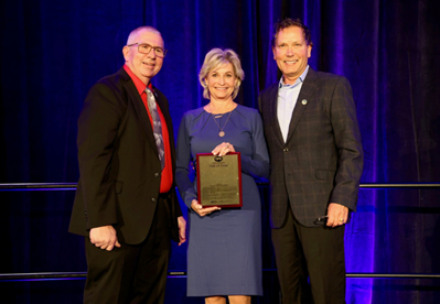Ken and Julie Maschhoff are presented with the Pork Industry Hall of Fame award in recognition of their contributions to the pork industry.