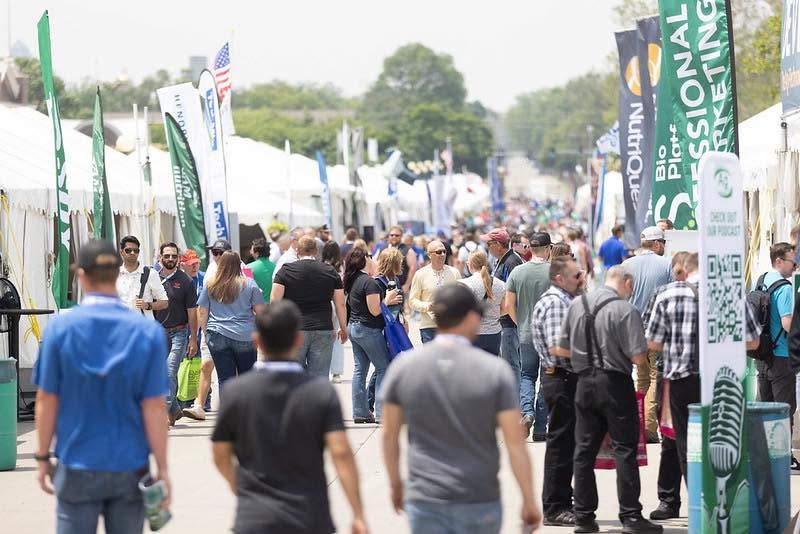 World Pork Expo attendees explore exhibitor booths.